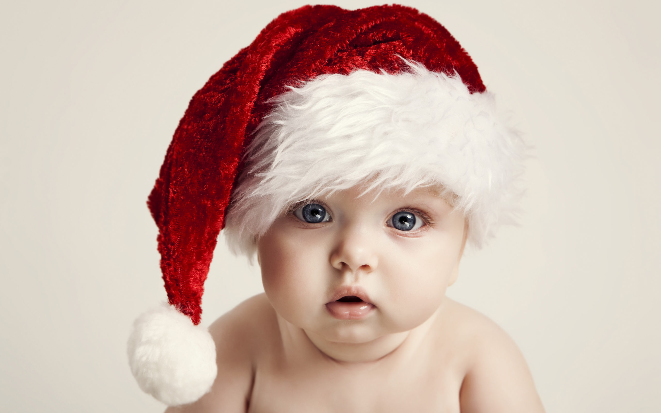 Baby wearing a santa hat