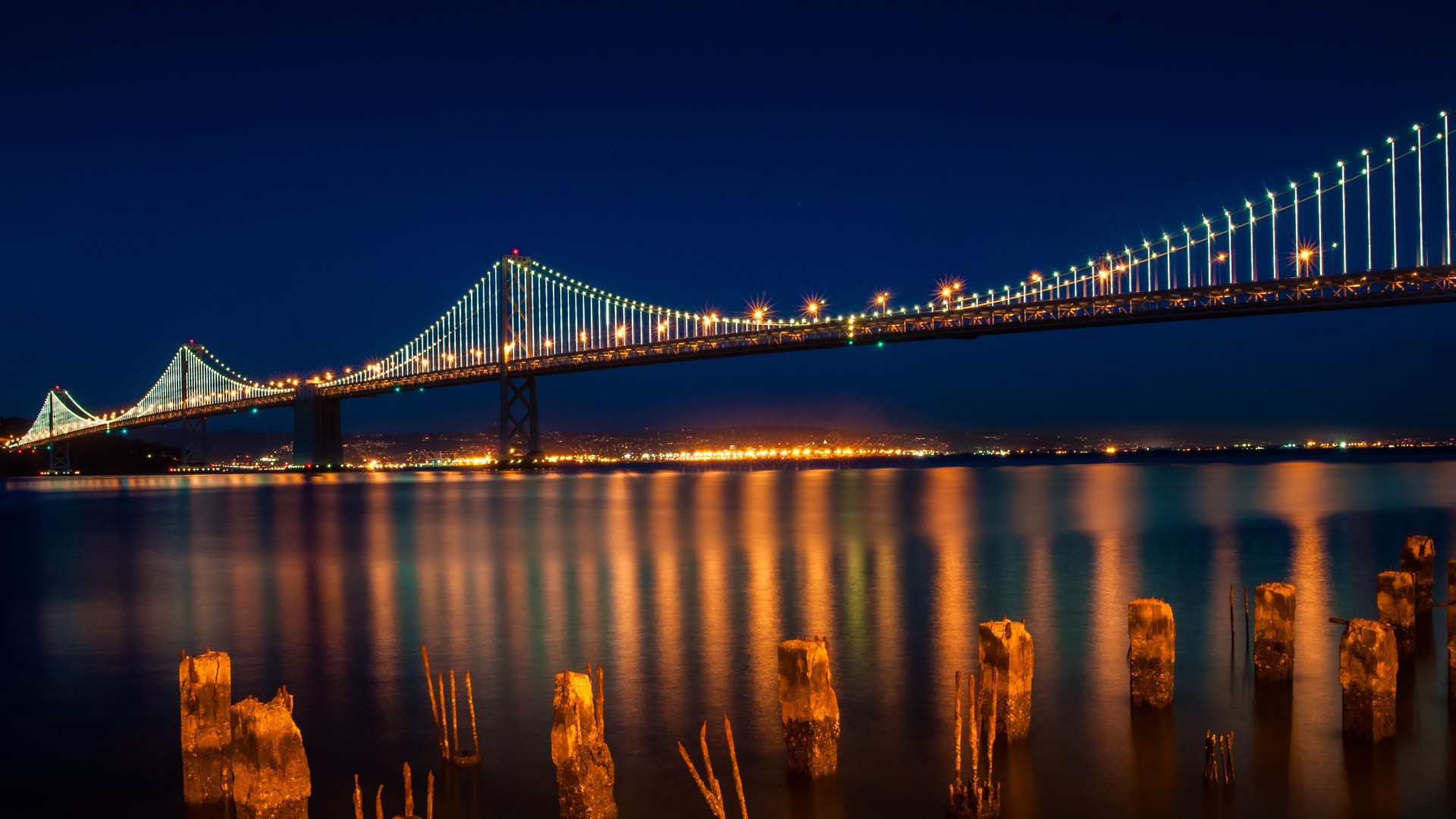 Bridge Lights Lanterns City View Reflection On Water Dark Sky Background