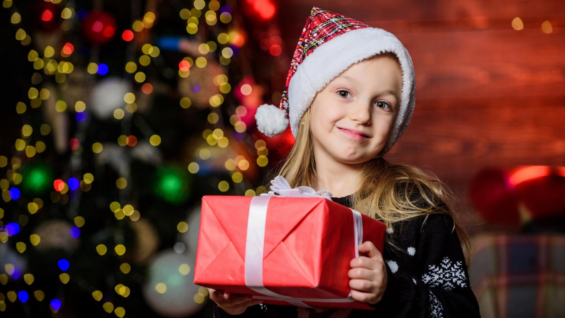 kids wear Santa hats